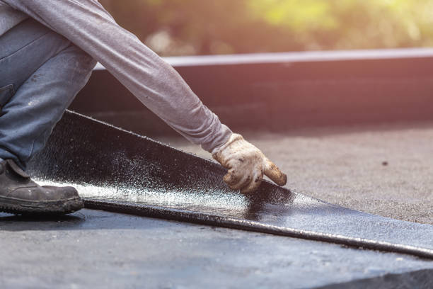 Professional Waterproofing technician working in Columbia City, IN